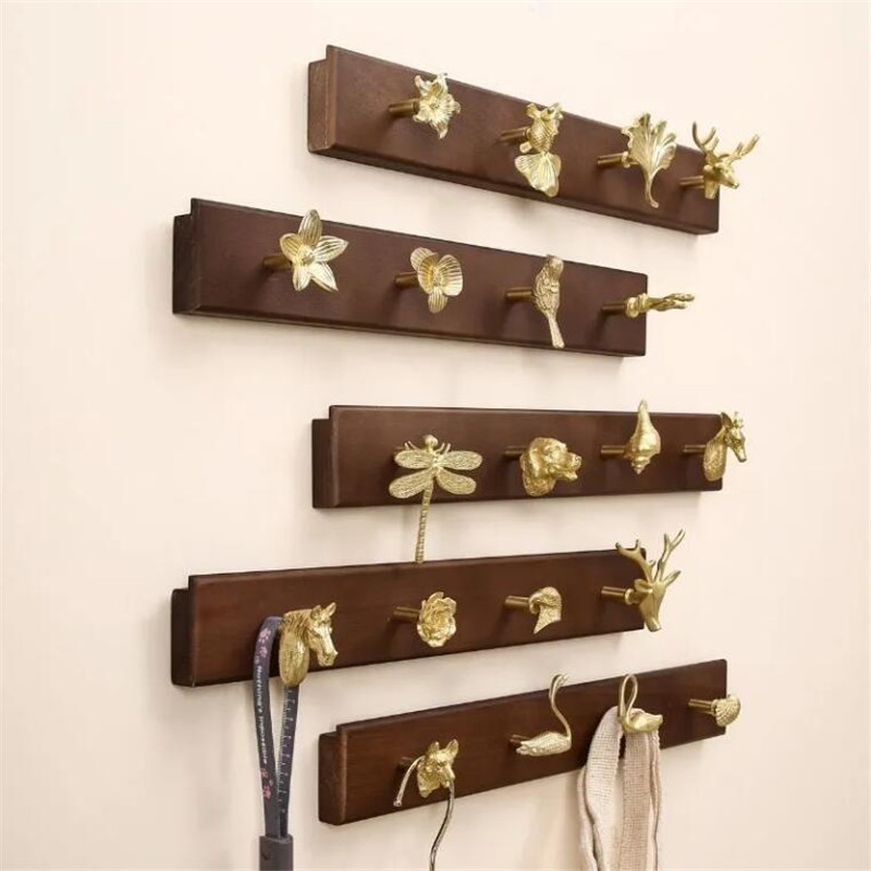 Wall Mount Row Hook Brass Anim - огляд і ціна Antique Brass Hook