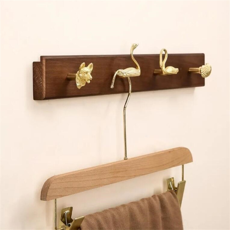 Wall Mount Row Hook Brass Anim - огляд і ціна Antique Brass Hook