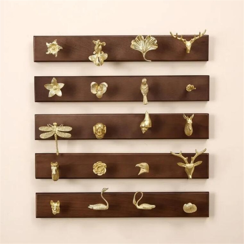 Wall Mount Row Hook Brass Anim - огляд і ціна Antique Brass Hook